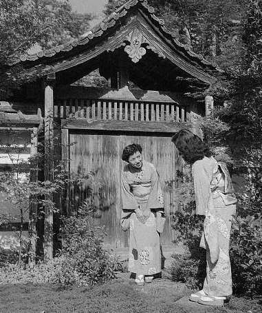 Two Geishas Greeting Each Other