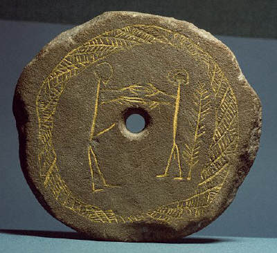Bronze Age sandstone lid of a cremation urn