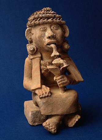 Veracruz Seated Female Holding a Flower