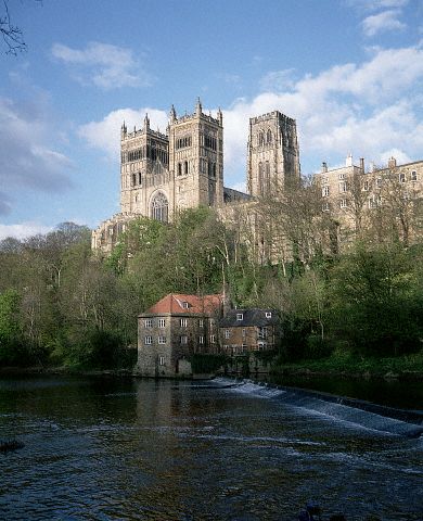 A view of Durham Cathedral from the south west showing the river Wear and the old fulling mill. England