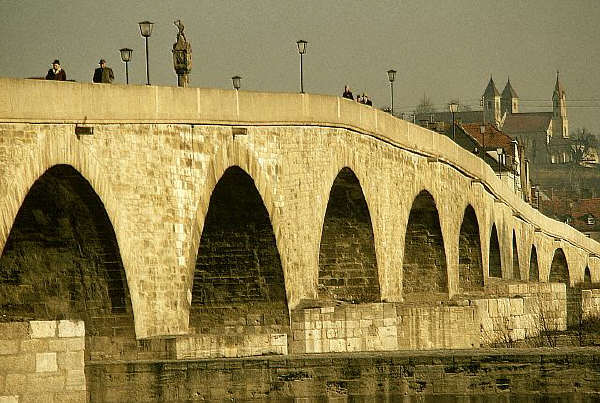 A 12th century bridge over the Danube River in Regensburg, Germany.