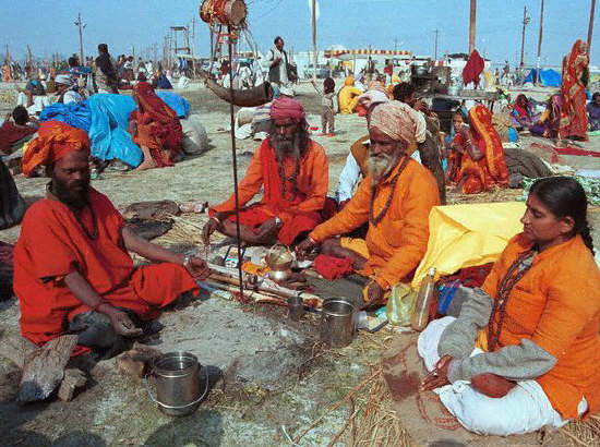 An ascetic with his disciples on the banks of the river