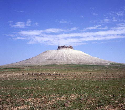 The ruins of a Roman fort, crown an extinct volcano at Shmiamis, in Syria.